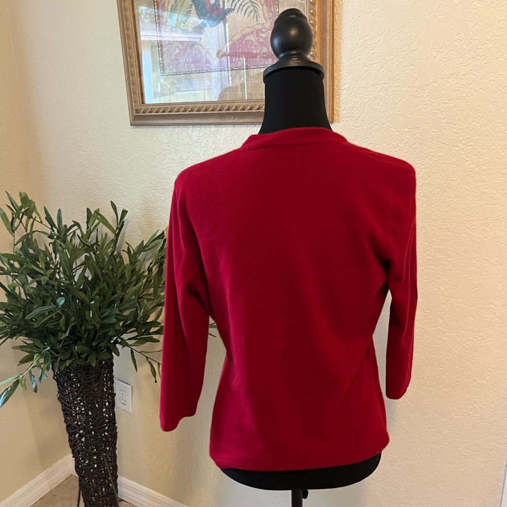 Soft red cashmere wrap sweater.